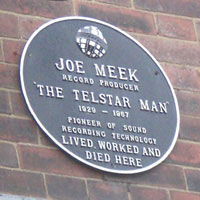 Commemorative plaque on the wall at 304 Holloway Road, London N7. It reads, 